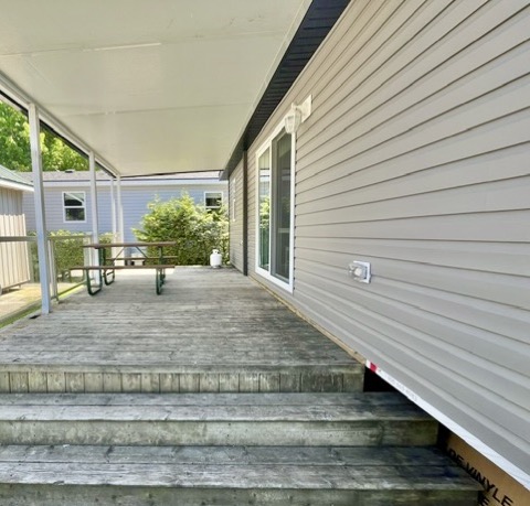 The Lodge 2 Bedroom Trailer rental covered deck