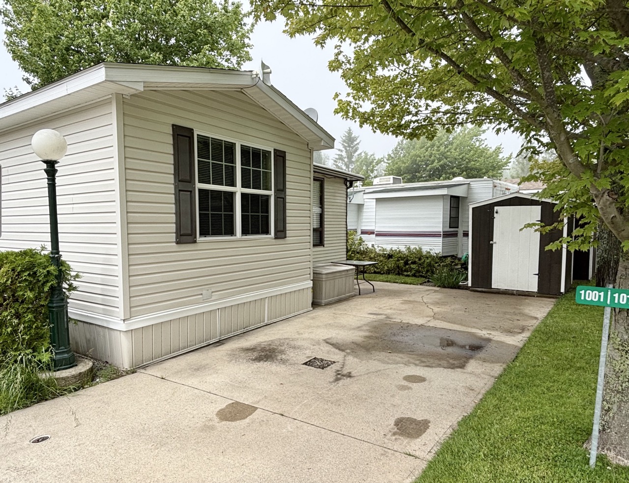 Site 1001 | For Sale | Scott Drive | 2 Bedroom Trailer | Driveway | Carsons Camp